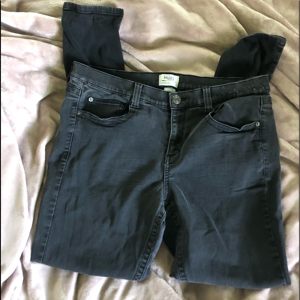 Worn faded black jeans skinny jeans